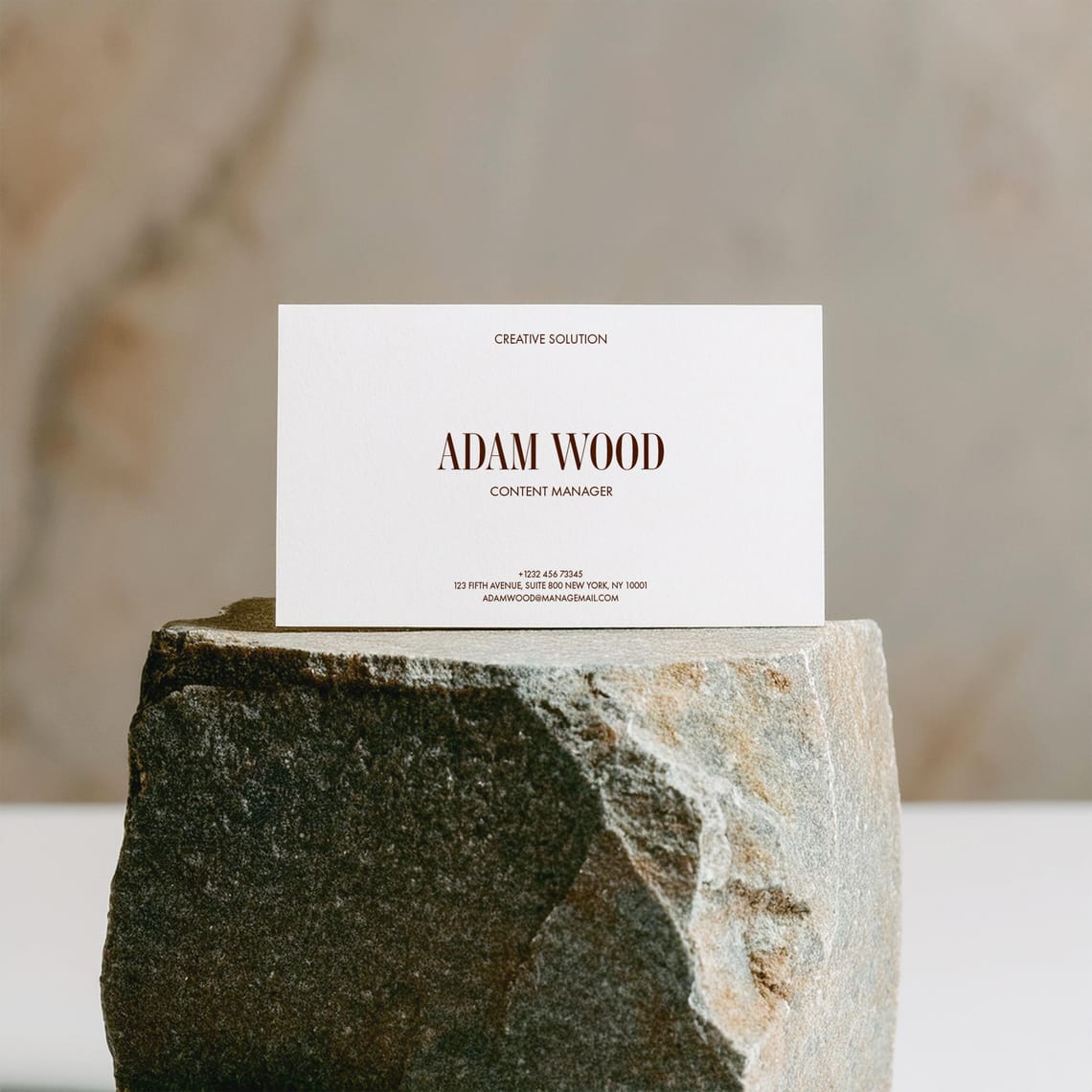 Business Card Mockup Standing On Marble Stone